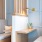 coworking booths with walls and couhc seating at Citizen House Blue Bluff apartments in Austin