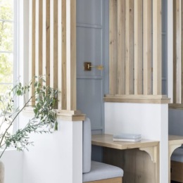 Thumbnail image of clubhouse interior with wood accents at Citizen House Blue Bluff apartments in East Austin, TX.